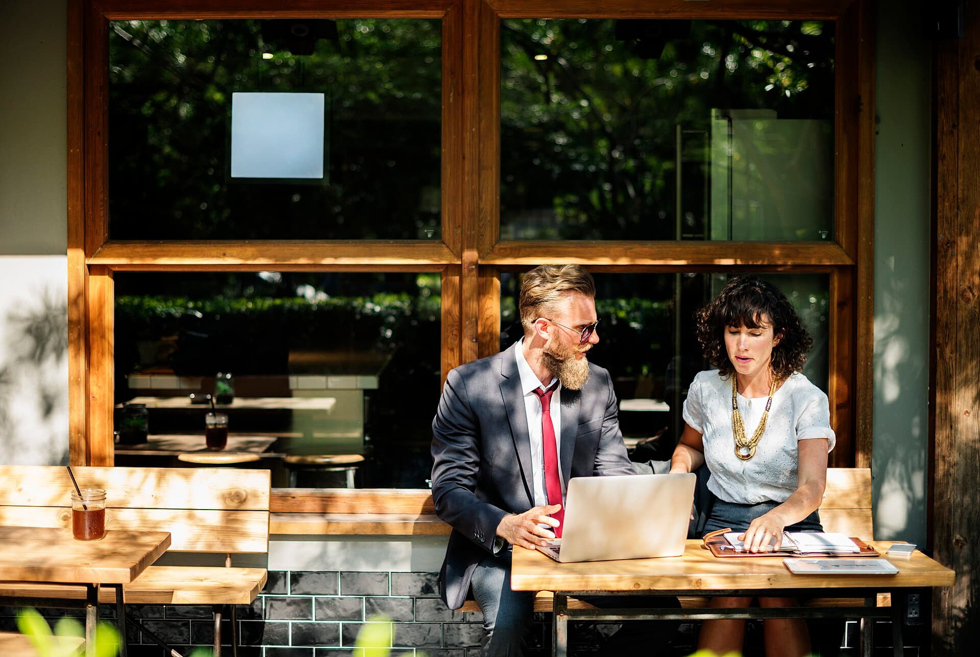 People discussing trading decisions in a professional workspace